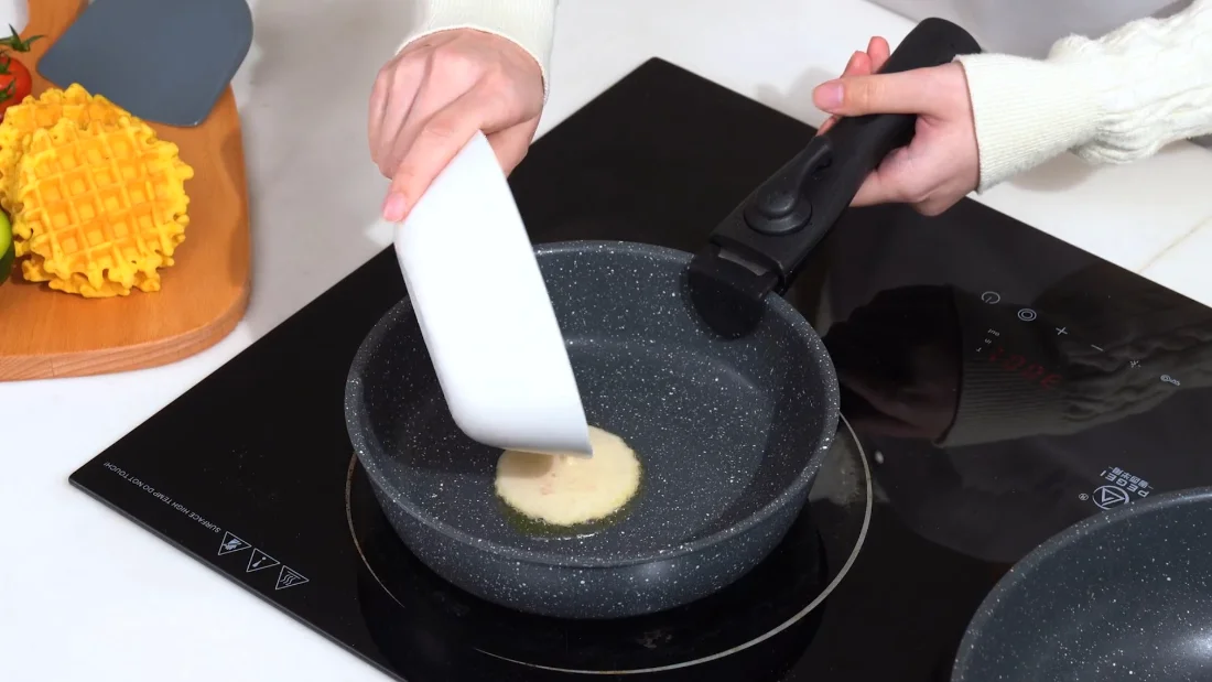Pancake batter meeting a warm, dry surface, and letting go later.