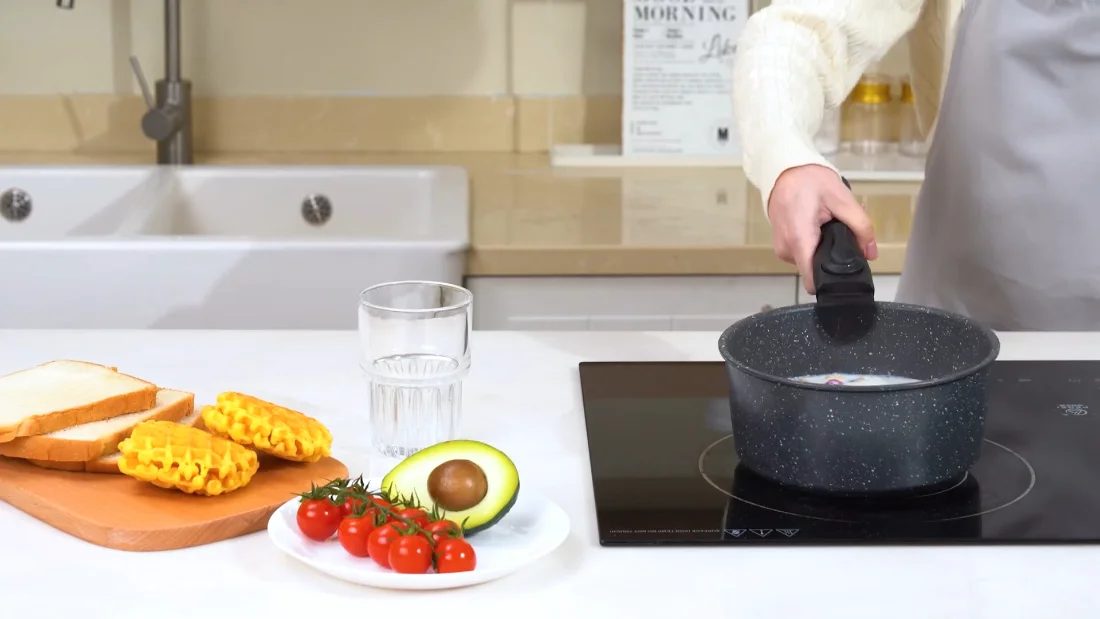 The handle clips on in one motion and locks twice before it lifts anything.