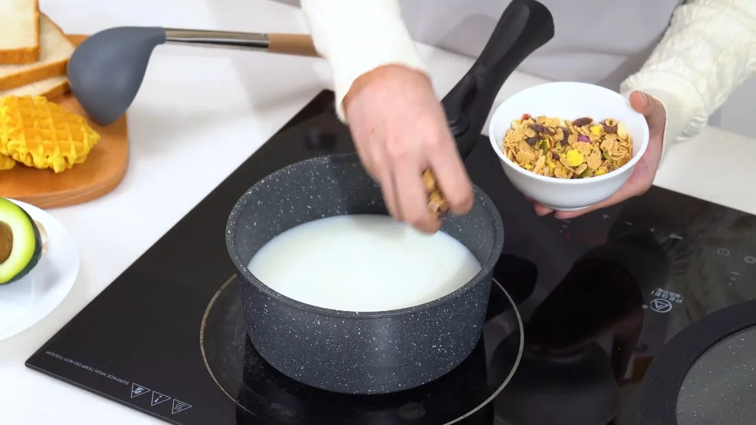 Milk in the saucepan: the job that tests a wipe-clean surface daily.
